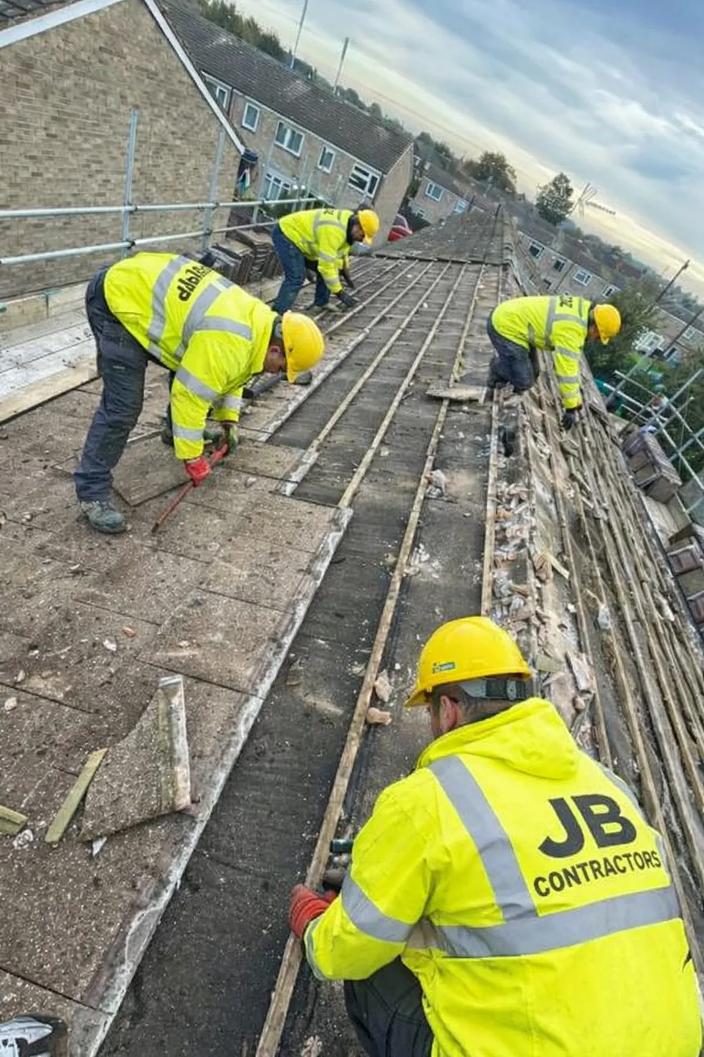 JB Contractors roofers at work on a roof